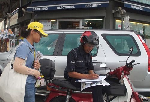 '圖14：警察在了解真相後，也簽名舉報迫害元凶江澤民。'